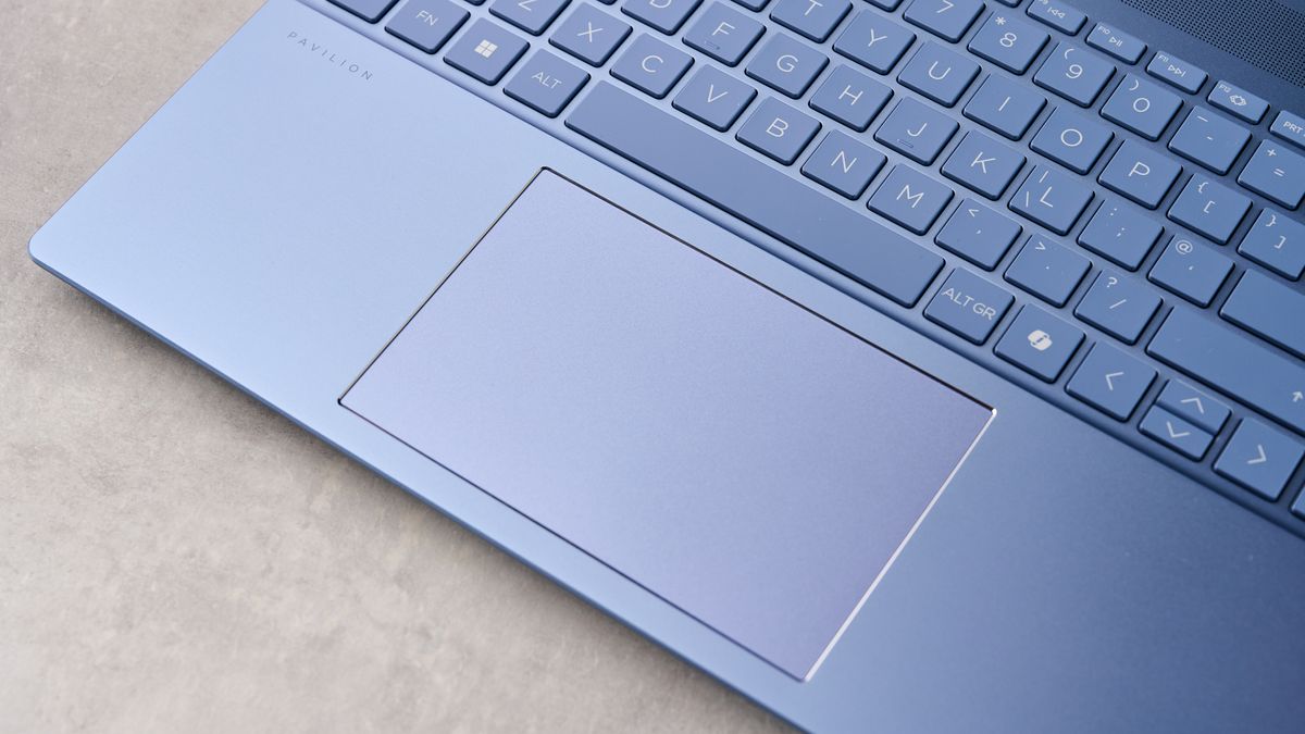 Close-up of touchpad on HP Pavilion 16, on a desk