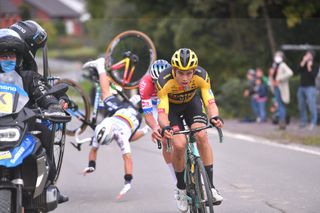 Wout van Aert (Jumbo-Visma) and Mathieu van der Poel (Alpecin-Fenix) push onwards at the 2020 Tour of Flanders as Julian Alaphilippe (Elegant-QuickStep) crashes after clipping a motorbike, ending the Frenchman’s race