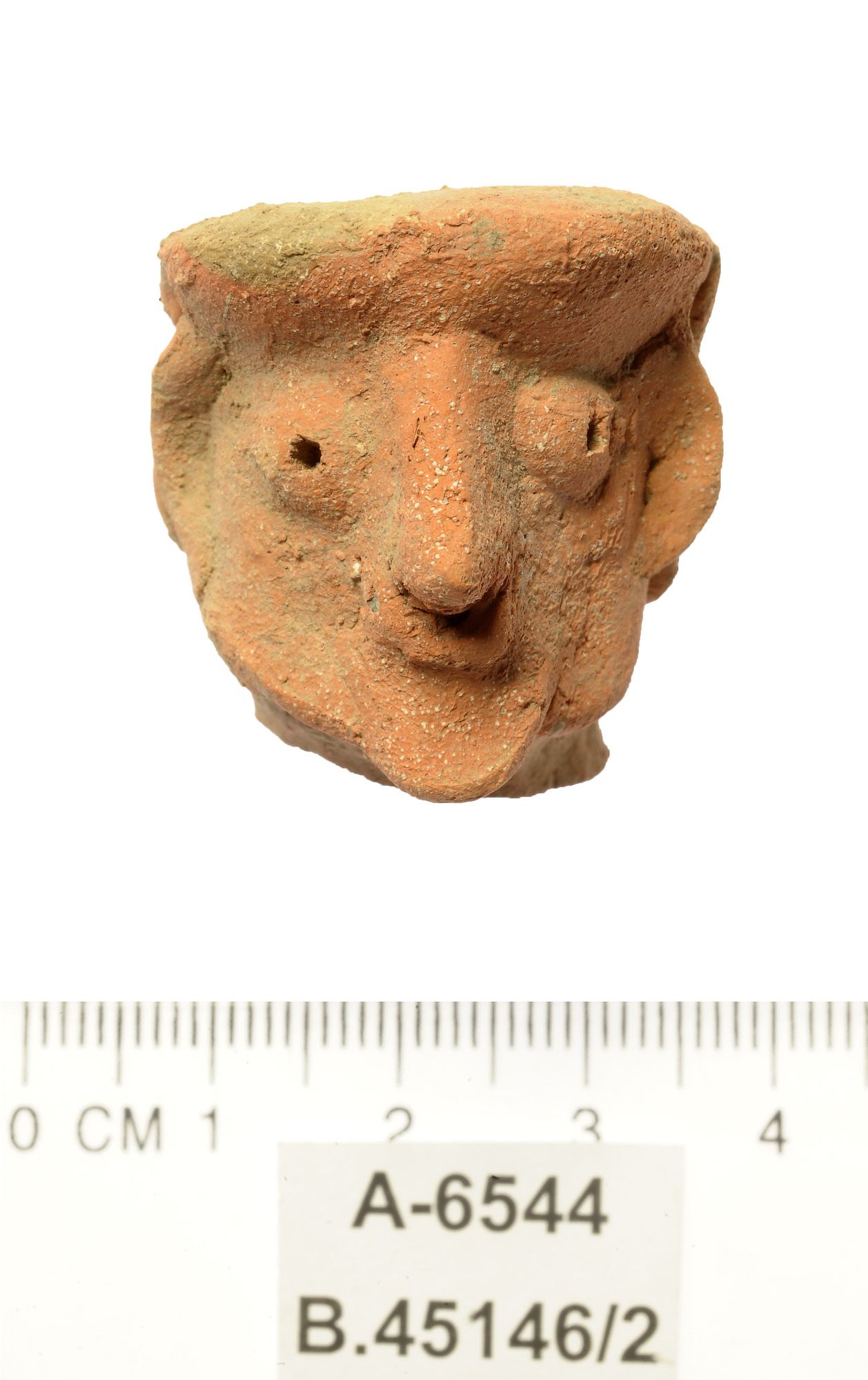 One of the two human-shaped figurines.