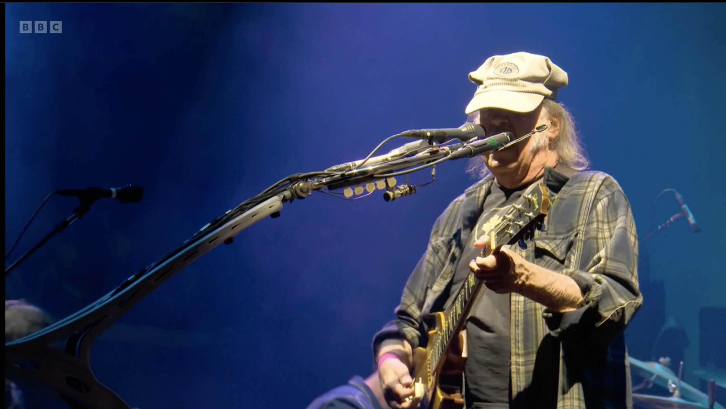 Neil Young performs live on stage at Glastonbury 2025