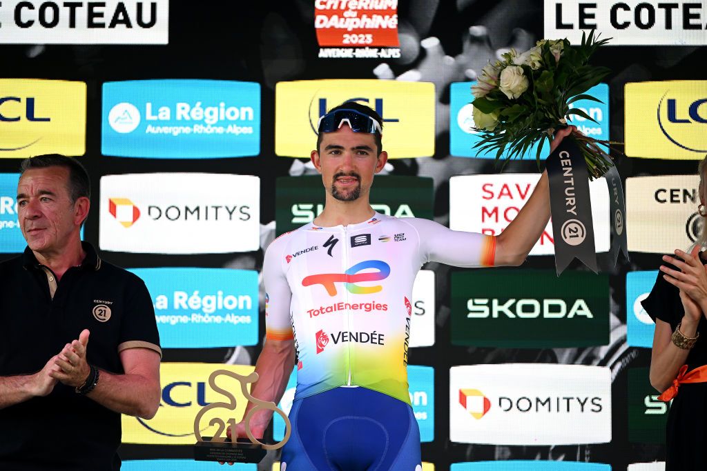 LE COTEAU FRANCE JUNE 06 EDITORS NOTE Alternate crop Mathieu Burgaudeau of France and Team TotalEnergiescelebrates at podium as most combative rider trophy during the 75th Criterium du Dauphine 2023 Stage 3 a 1941km stage from MonistrolsurLoire to Le Coteau UCIWT on June 06 2023 in Le Coteau France Photo by Dario BelingheriGetty Images