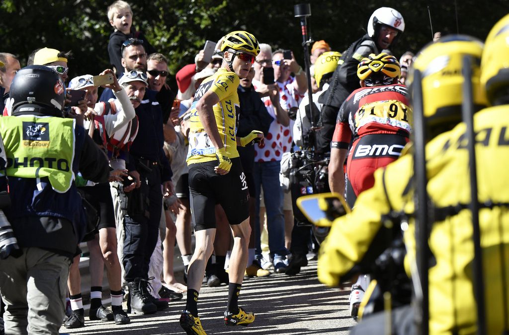 Chris Froome running up Mont Ventoux after the moto incident