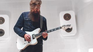 Jim Root playing is his Jazzmaster V4