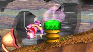 The Tomba protagonist prepares to hurl an enemy pig across the level.