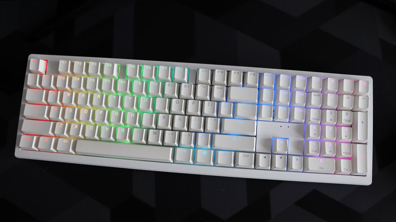 Ducky Zero 6108 gaming keyboard in white on a desk.