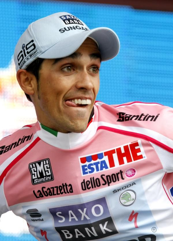 Alberto Contador pulls on another pink jersey