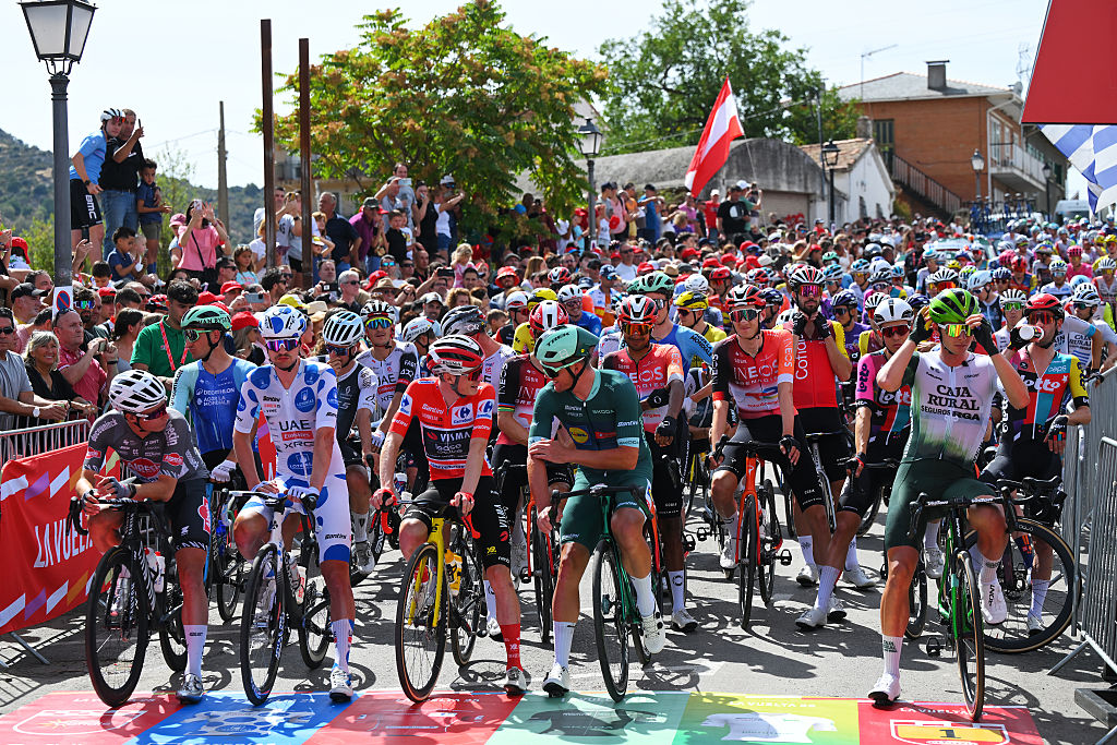 ROBLEDO DE CHAVELA, SPAIN - SEPTEMBER 13: (L-R) Jasper Philipsen of Belgium and Team Alpecin - Deceuninck, Jay Vine of Australia and UAE Team Emirates - XRG - Polka Dot Mountain Jersey, Jonas Vingegaard of Denmark and Team Visma | Lease a Bike - Red Leader Jersey and Mads Pedersen of Denmark and Team Lidl - Trek - Green Points Jersey prior to the La Vuelta - 80th Tour of Spain 2025, Stage 20 a 164.8km stage from Robledo de Chavela to Bola del Mundo. Puerto de Navacerrada 2253m / #UCIWT / on September 13, 2025 in Robledo de Chavela, Spain. (Photo by Tim de Waele/Getty Images)