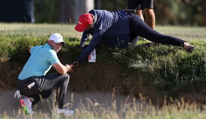 Rory talks to official during a drop