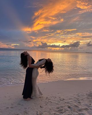 kaia gerber and camila morrone on the beach in the cayman islands