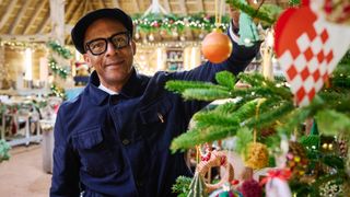 Jay Blades decorates a Christmas tree in The Repair Shop Christmas Special 2022