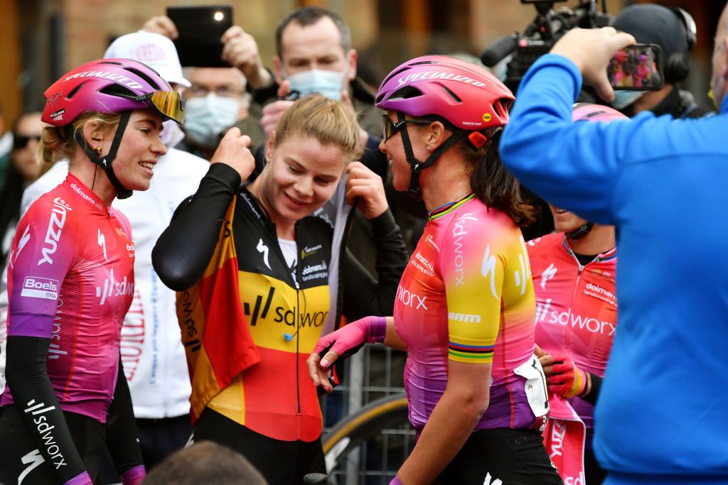 SIENA ITALY MARCH 05 LR Demi Vollering of Netherlands and Chantal Van Den Broek Blaak of Netherlands celebrate the victory of his teammate Lotte Kopecky of Belgium and Team SD Worx during the Eroica 8th Strade Bianche 2022 Womens Elite a 136km one day race from Siena to Siena Piazza del Campo 321m StradeBianche on March 05 2022 in Siena Italy Photo by Luc ClaessenGetty Images