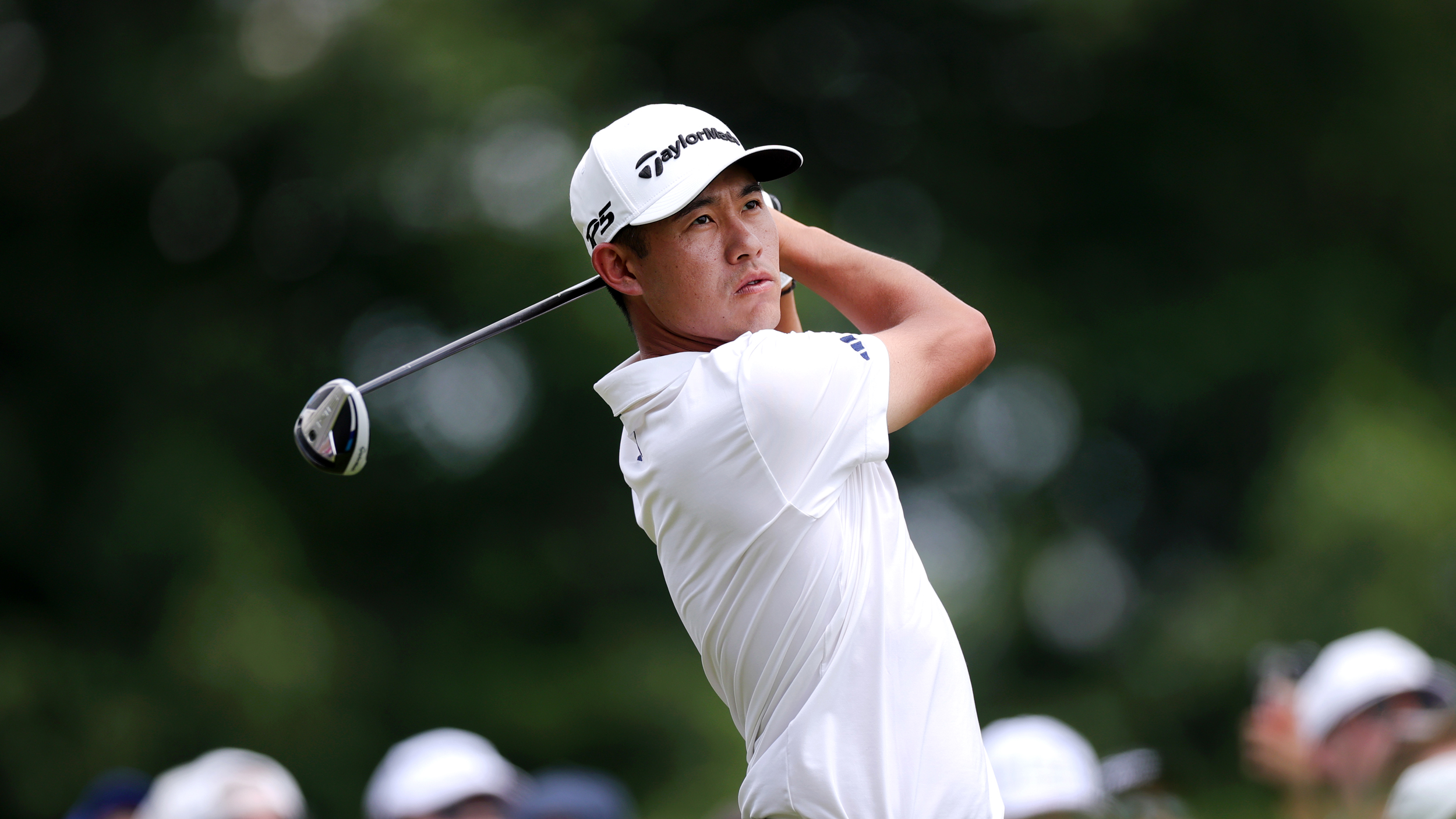 Collin Morikawa hits a 3-wood during round three of the Travelers Championship