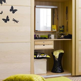 room with dressing table and sliding wardrobe doors