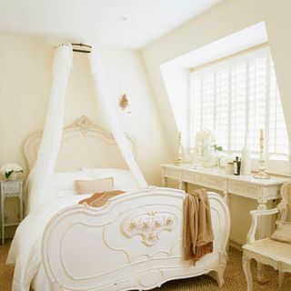 attic bedroom with white wall and console table
