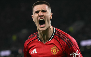 Manchester United's Slovenian striker #30 Benjamin Sesko celebrates scoring the opening goal during the English Premier League football match between Everton and Manchester United at the Hill Dickinson Stadium in Liverpool, north west England on February 23, 2026.