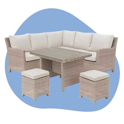 A graphic of one of the best rattan garden furniture sets - a sofa with cream upholstered cushions on a blue background