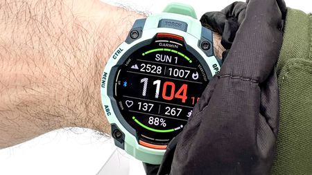 Close-up of the Garmin Instinct 3 while snowboarding