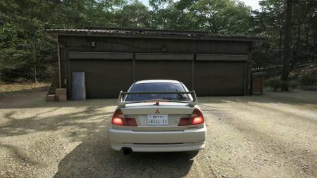 Forza Horizon 6 player in Mitsubishi driving up to Barn Find barn
