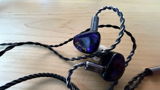 The purple Kiwi Ears Cadanza earphones. 