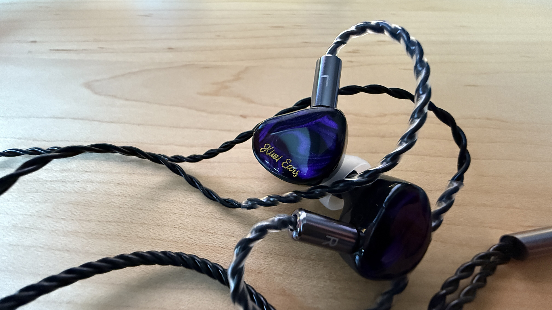 The purple Kiwi Ears Cadanza earphones. 