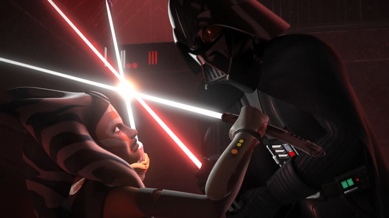 Extrait de la série télévisée Star Wars Rebels.  Ahsoka (visage orange avec des marques blanches et des queues de tête dénudées de bleu et blanc) et Dark Vador (casque, costume et cape noirs) sont engagés dans une bataille féroce au sabre laser.  Ahsoka se protège avec deux sabres laser bleus courts maintenus en formation en X, tandis que Dark Vador la maîtrise avec son sabre laser rouge.