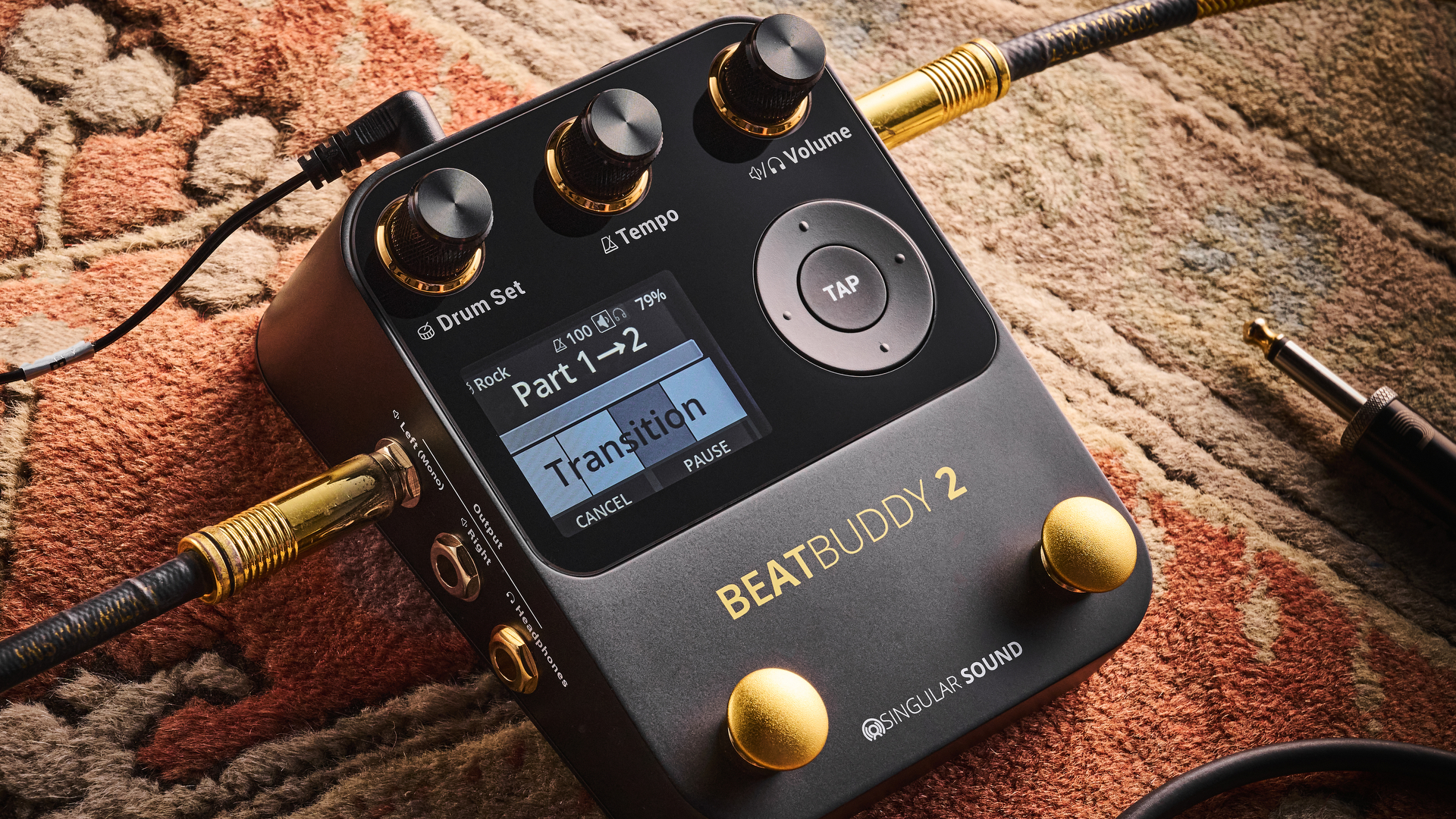 A Singular Sound BeatBuddy 2 guitar pedal on a rug