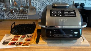Ninja 5-in-1 Grill and Air Fryer with accessories