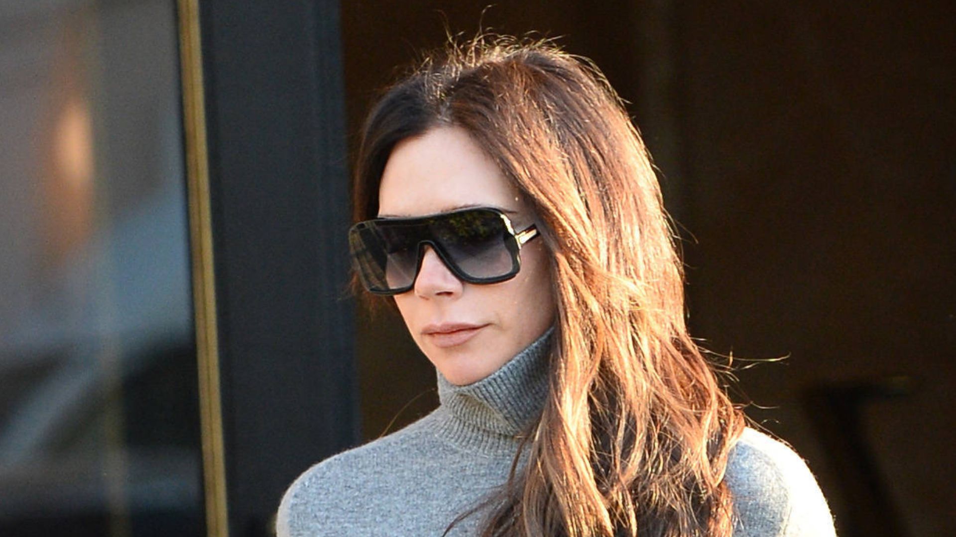 Victoria Beckham wearing wide leg trousers and turtleneck knit in Paris, France on 2 March, 2023