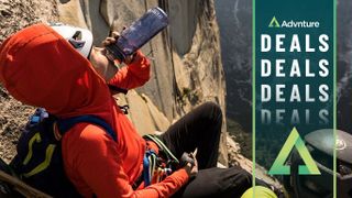 Climber on wall drinking from Yeti Yonder water bottle