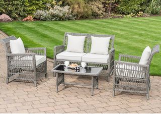 garden sofa set with coffee table and armchairs