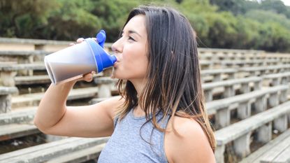 Woman drinking a protein shake