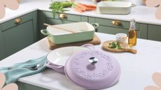 Green kitchen with white countertops showing the Aldi cast iron cookware in lilac and pastel green