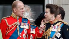Prince Philip and Princess Anne watch a flypast from the balcony of Buckingham Palace during the annual Trooping the Colour Parade on June 16, 2007