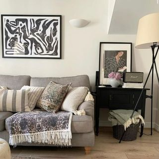neutral living room with earth tones and artwork