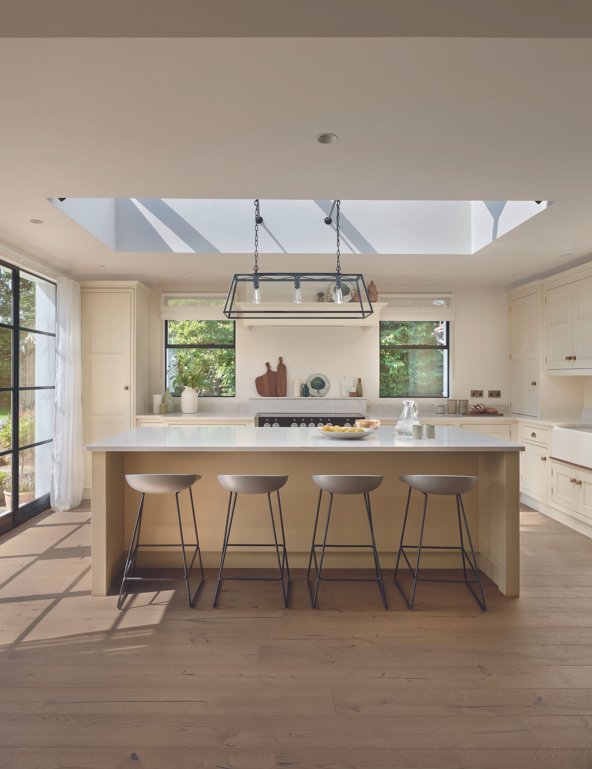 A kitchen with buttery yellow island