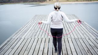 A woman skipping