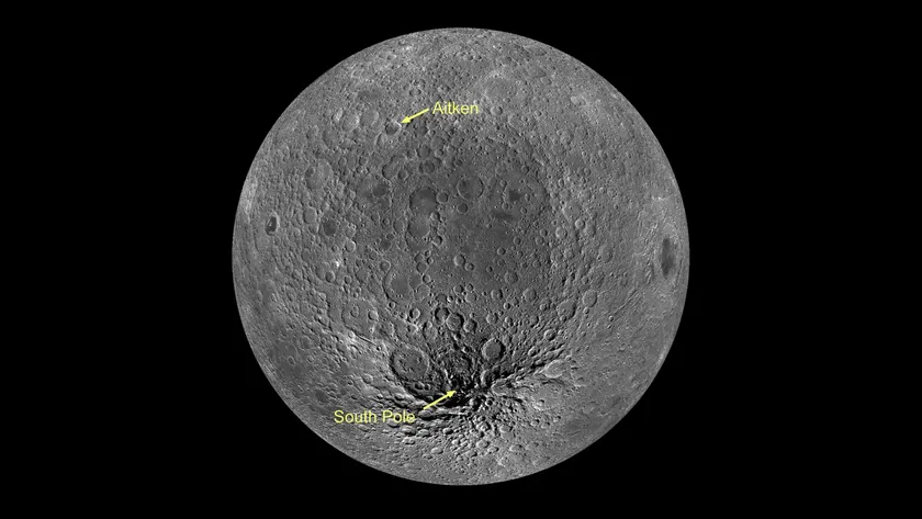 The moon against a dark background. The south pole is pointed out.