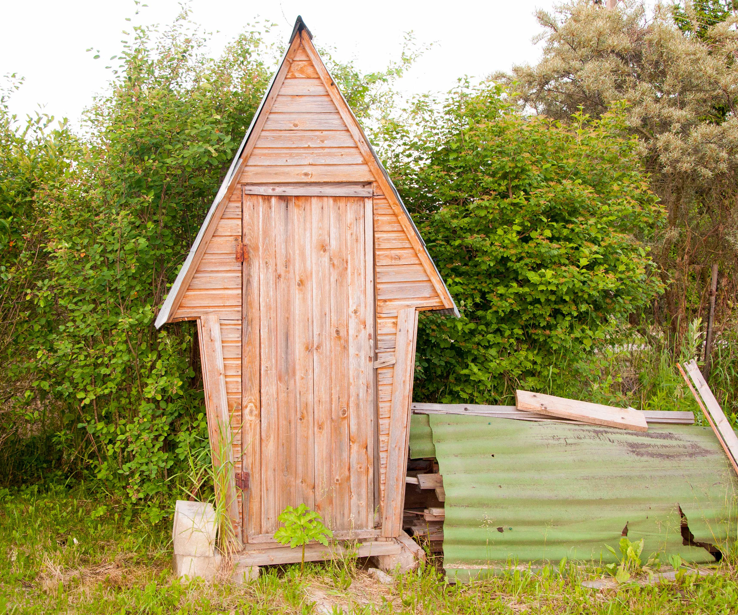 small shed made of wood in backyard