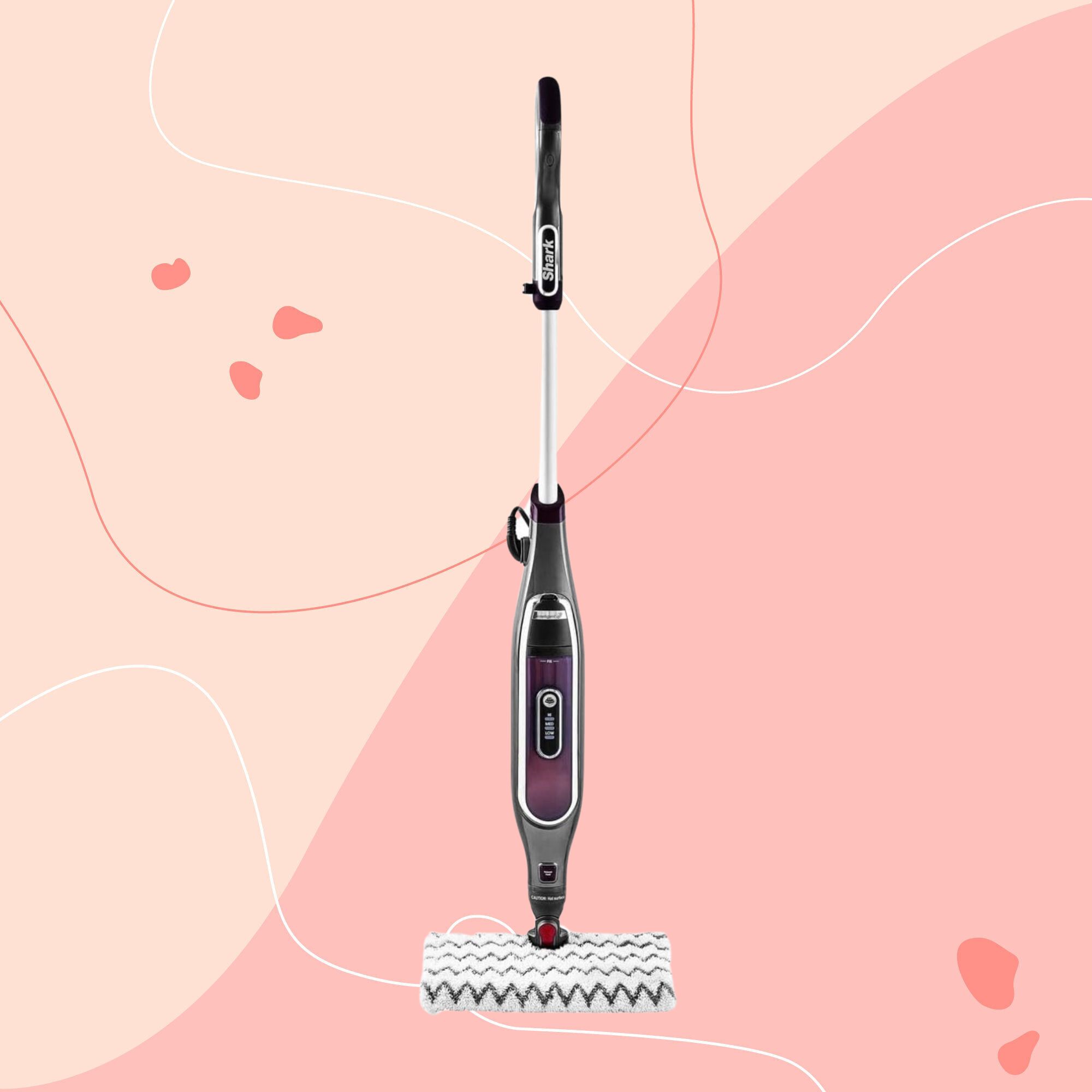 Shark Klik n Flip Automatic Steam Mop on a pink background
