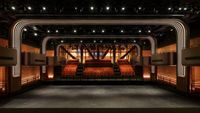 The performance space inside Apple Music Hall with tiered seating.