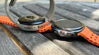 The Galaxy Watch 5 Pro (silver) versus the Galaxy Watch Ultra (black)