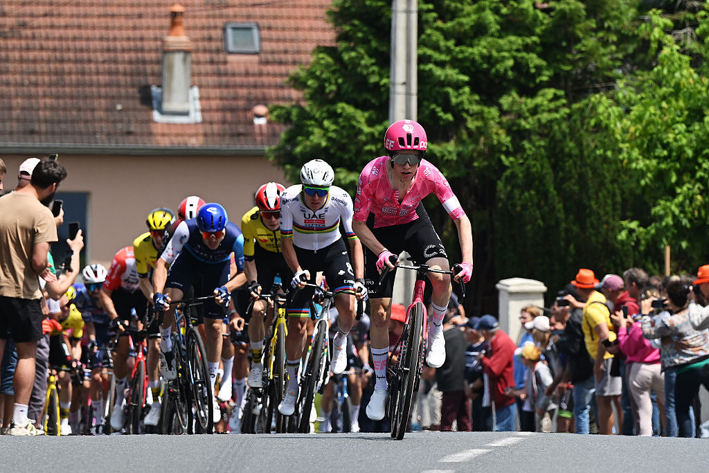 Archie Ryan attacking over the top of the climb with Pogačar at the front of the chase
