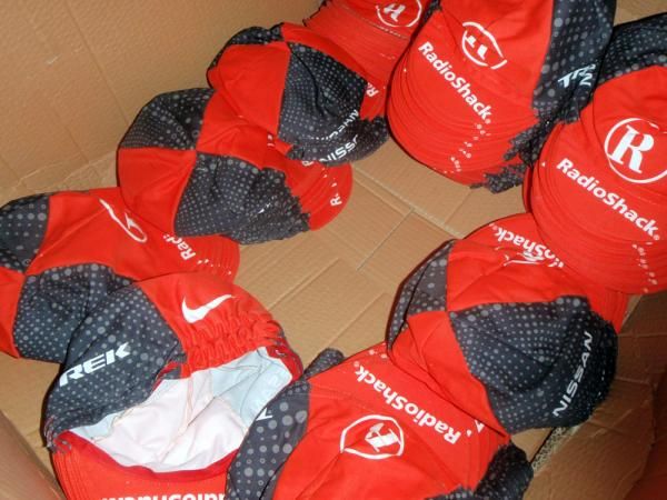 Cycling caps are piled high at the Service Course