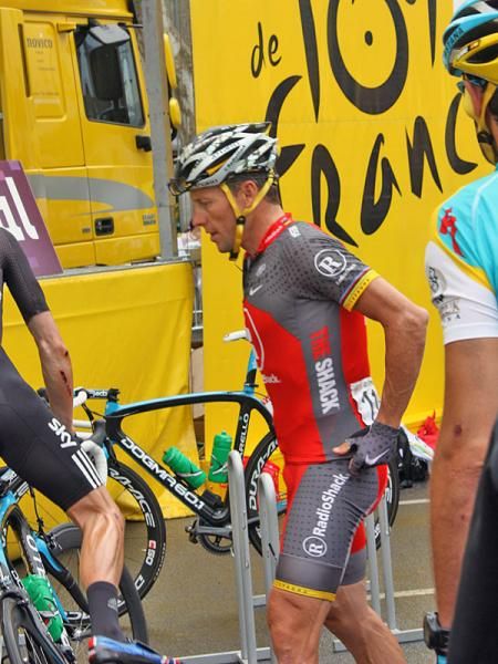 Lance Armstrong (Team Radioshack) makes his way towards the stairs.