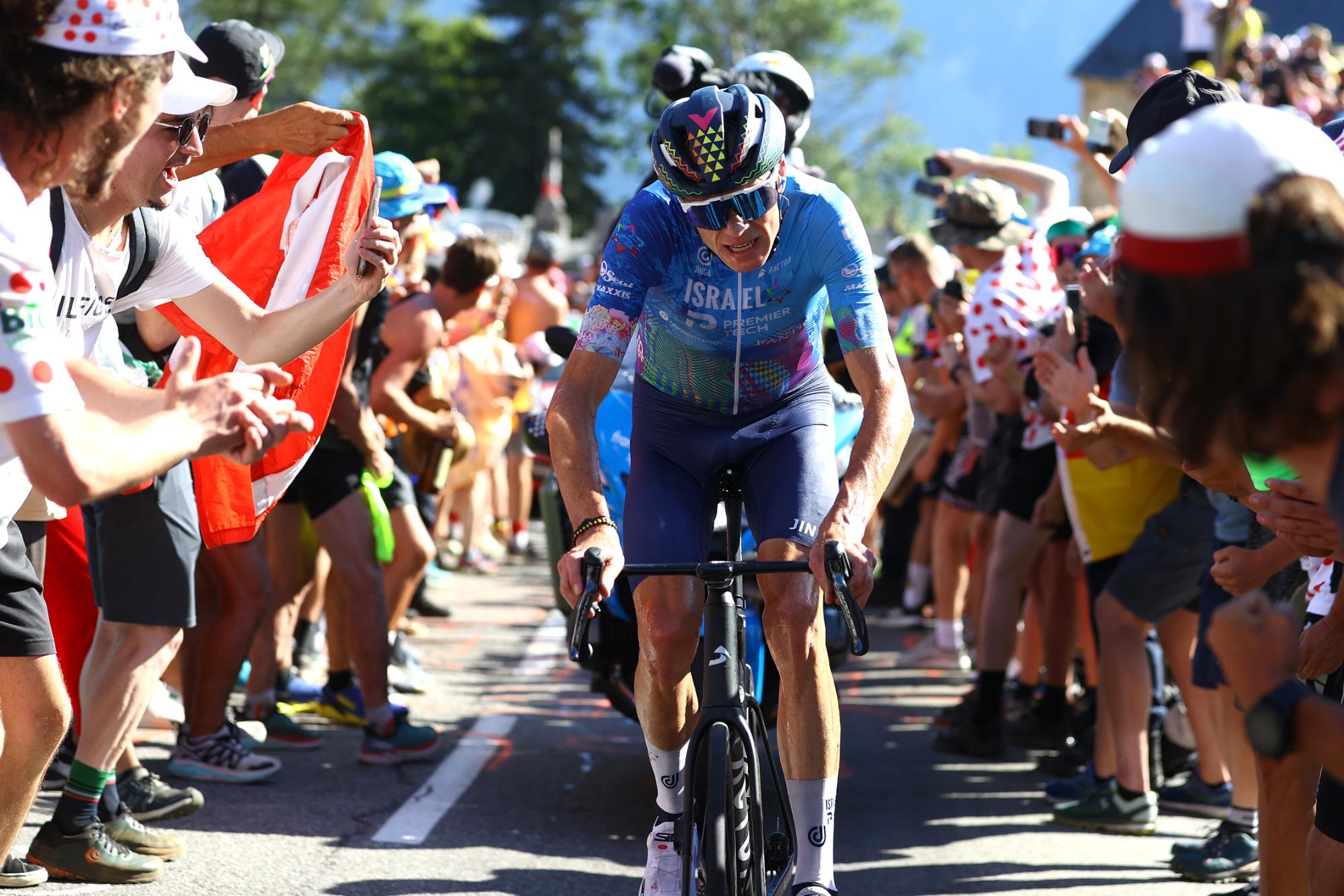 Christopher Froome (Israel - Premier Tech) rides through the crowds on l'Alpe d'Huez during stage 12 of the 2022 Tour de France. (Photo by Michael Steele/Getty Images)