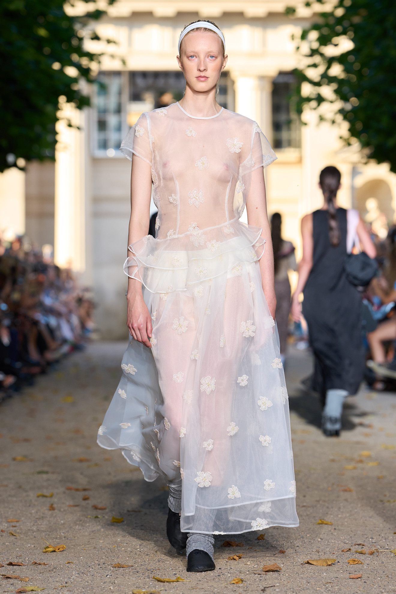Runway model walking in show at Copenhagen Fashion Week spring/summer 2027.
