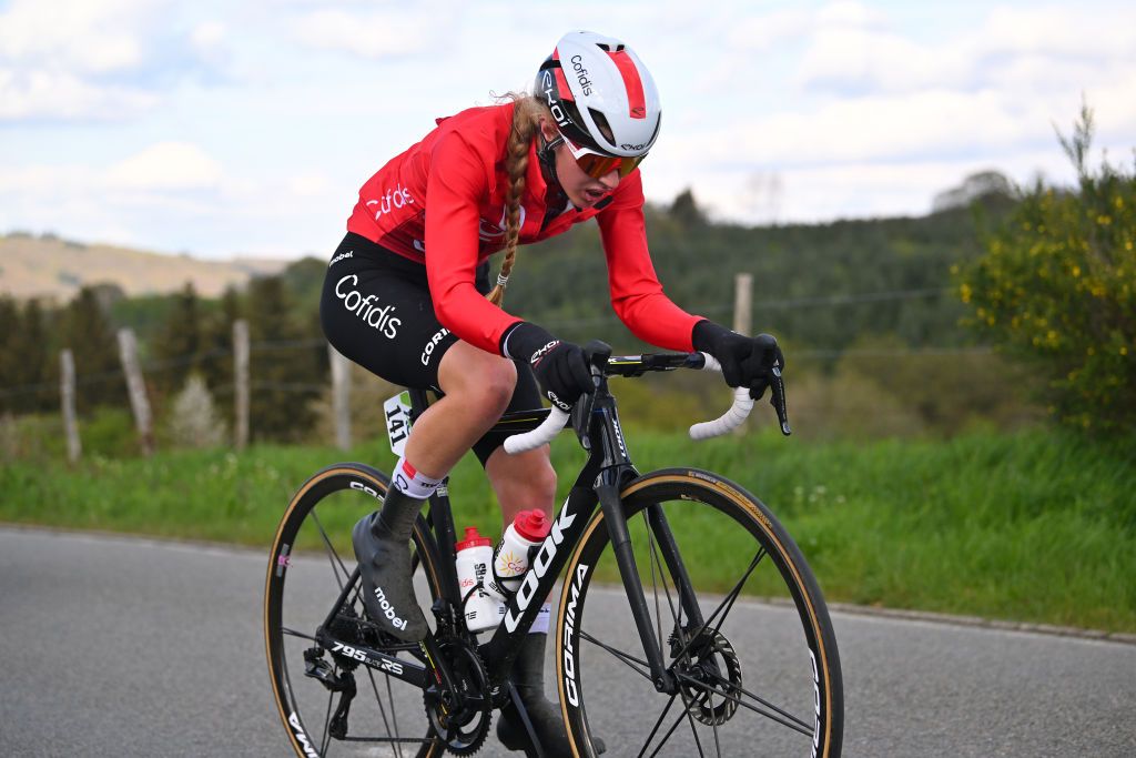 LIEGE BELGIUM APRIL 24 Julie Bego of France and Cofidis Women Team competes in the chase group during the 8th Liege Bastogne Liege Femmes 2024 a 1529km one day race from Bastogne to Liege UCIWWT on April 24 2024 in Liege Belgium Photo by Luc ClaessenGetty Images