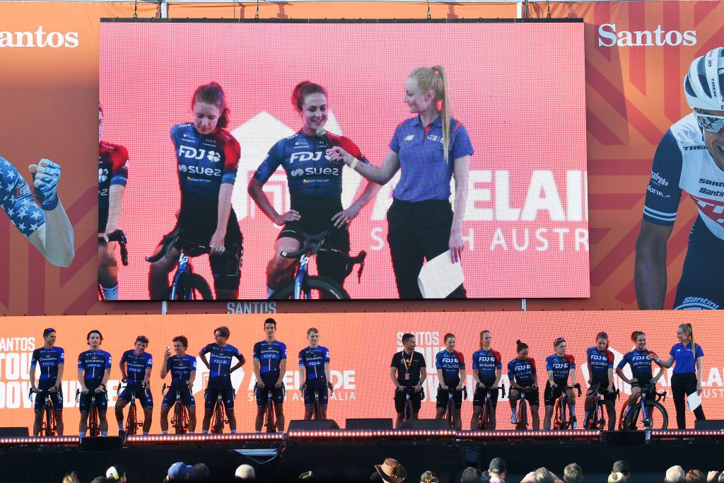 ADELAIDE AUSTRALIA JANUARY 13 A general view of Michael Storer of Australia Miles Scotson of Australia Lorenzo Germani of Italy Reuben Thompson of New Zealand Laurence Pithie of New Zealand Paul Penhoet of France Rudy Molard of France and Team Groupama FDJ and Grace Brown of Australia Loes Adegeest of Netherlands Clara Copponi of France Eugenie Duval of France Victorie Guilman of France Gladys Verhulst of France and Team FDJSuez during the 23rd Santos Tour Down Under 2023 Team Presentation TourDownUnder on January 13 2023 in Adelaide Australia Photo by Tim de WaeleGetty Images