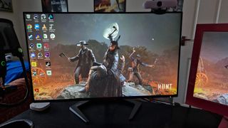 Philips Momentum 5000 Review image showing a HUNT Showdown desktop background with various PC icons on the left