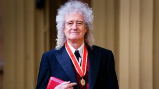 Brian May after being knighted
